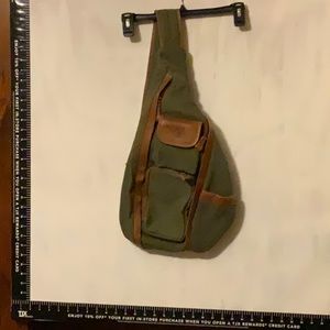 Canvas and leather sling backpack